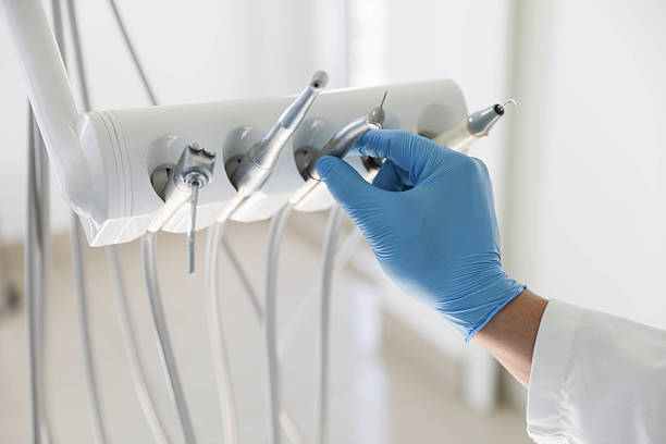 Professional Tooth Extraction technician working in Welsh, LA